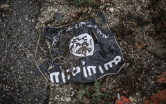 Флаг радикальной  группировки ИГИЛ. © РИА Новости, Андрей Стенин