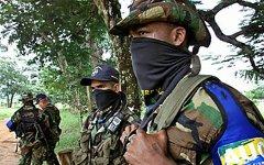 Члены «Объединенных сил самообороны Колумбии». Фото с сайта current.com Члены «Объединенных сил самообороны Колумбии». Фото с сайта current.com