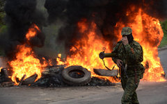 Ополченец на блокпосту под Славянском © РИА Новости, Михаил Воскресенский Ополченец на блокпосту под Славянском © РИА Новости, Михаил Воскресенский
